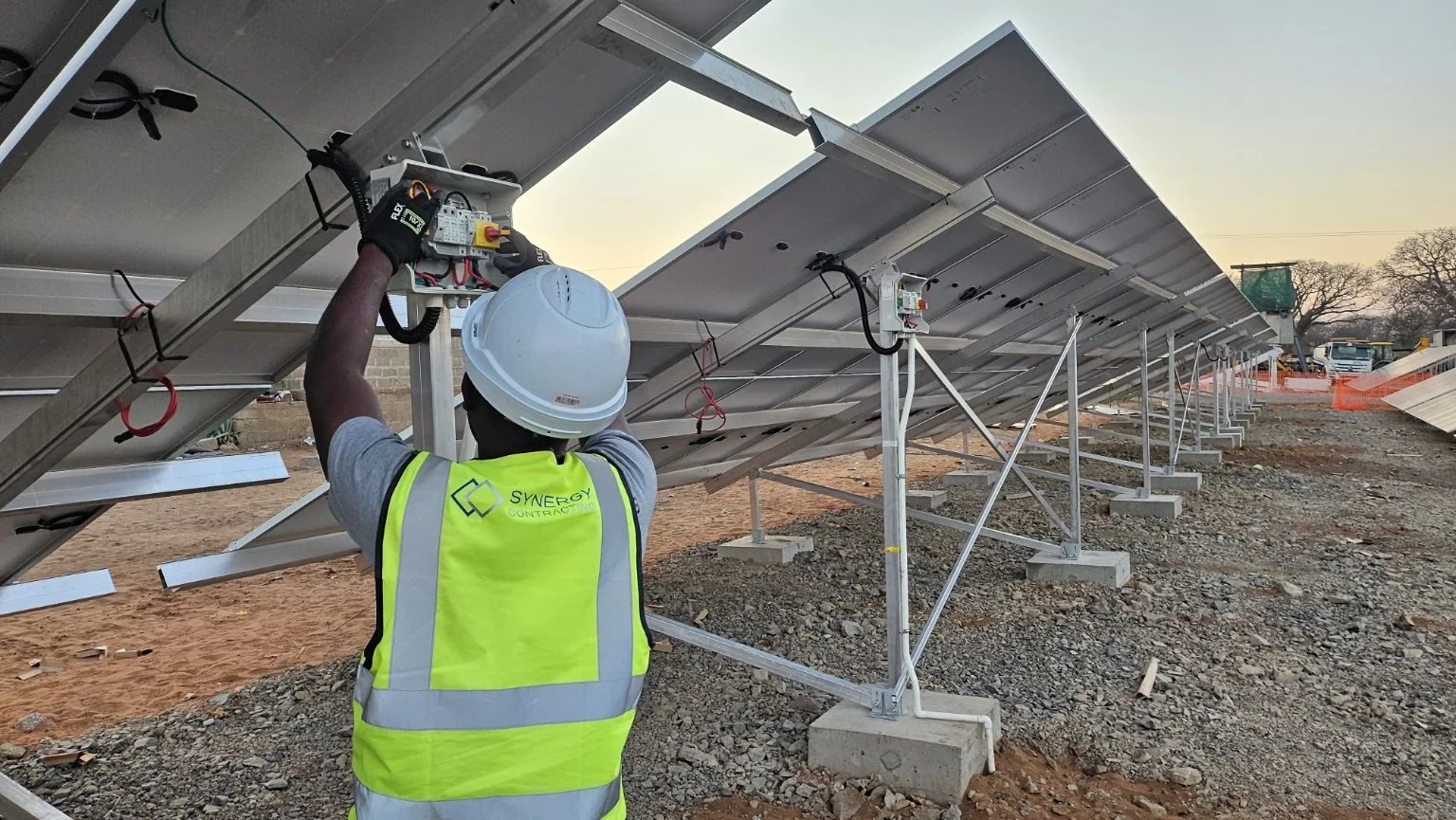 Synergy team installing ground-mounted solar at Kazungula